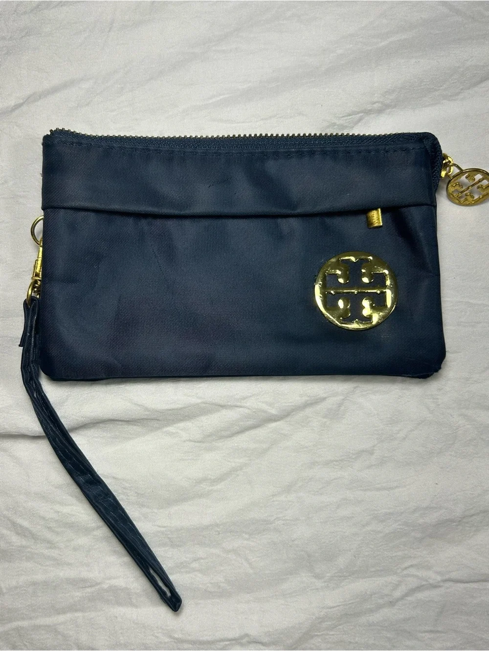 Tory Burch Navy Wristlet with Gold Emblem